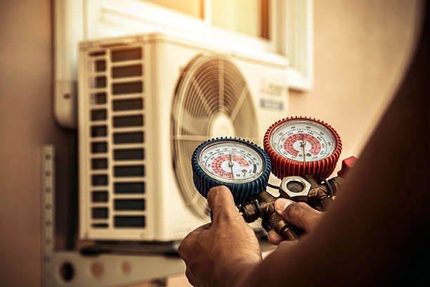 Professional Hvac technician working in Adams, WI